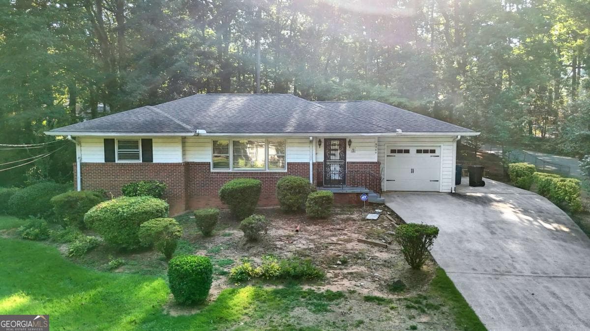 3 bedroom, 2.5 bathroom, 1,141 sq ft single family residence for sale at 2560 Wood Valley Drive, East Point, GA 30344 — photo 2