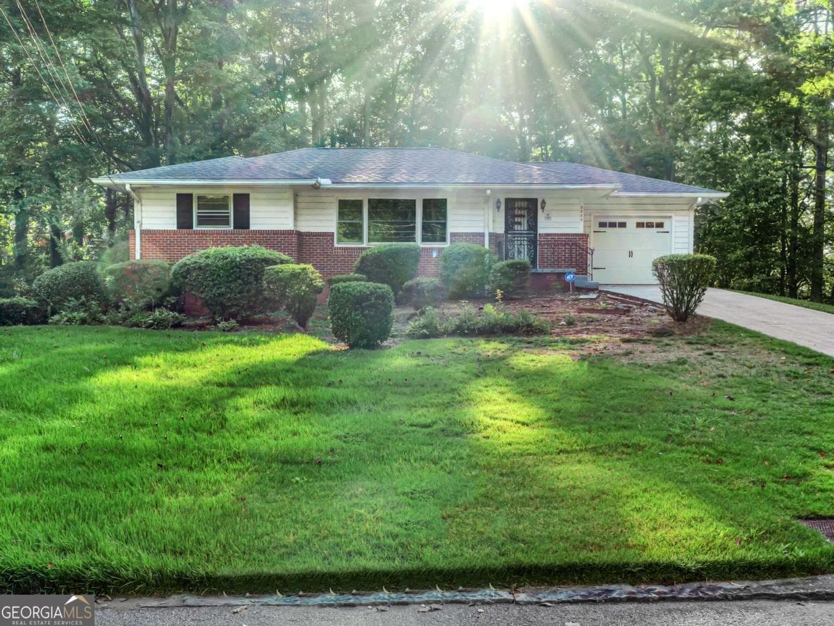 3 bedroom, 2.5 bathroom, 1,141 sq ft single family residence for sale at 2560 Wood Valley Drive, East Point, GA 30344 — photo 1 of 32
