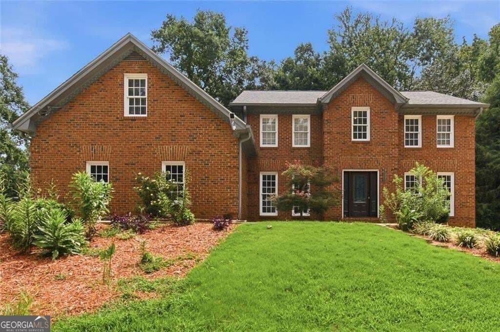 7 bedroom, 4 bathroom, 3,897 sq ft single family residence for sale at 24 Planters Drive, Lilburn, GA 30047 — photo 1 of 54