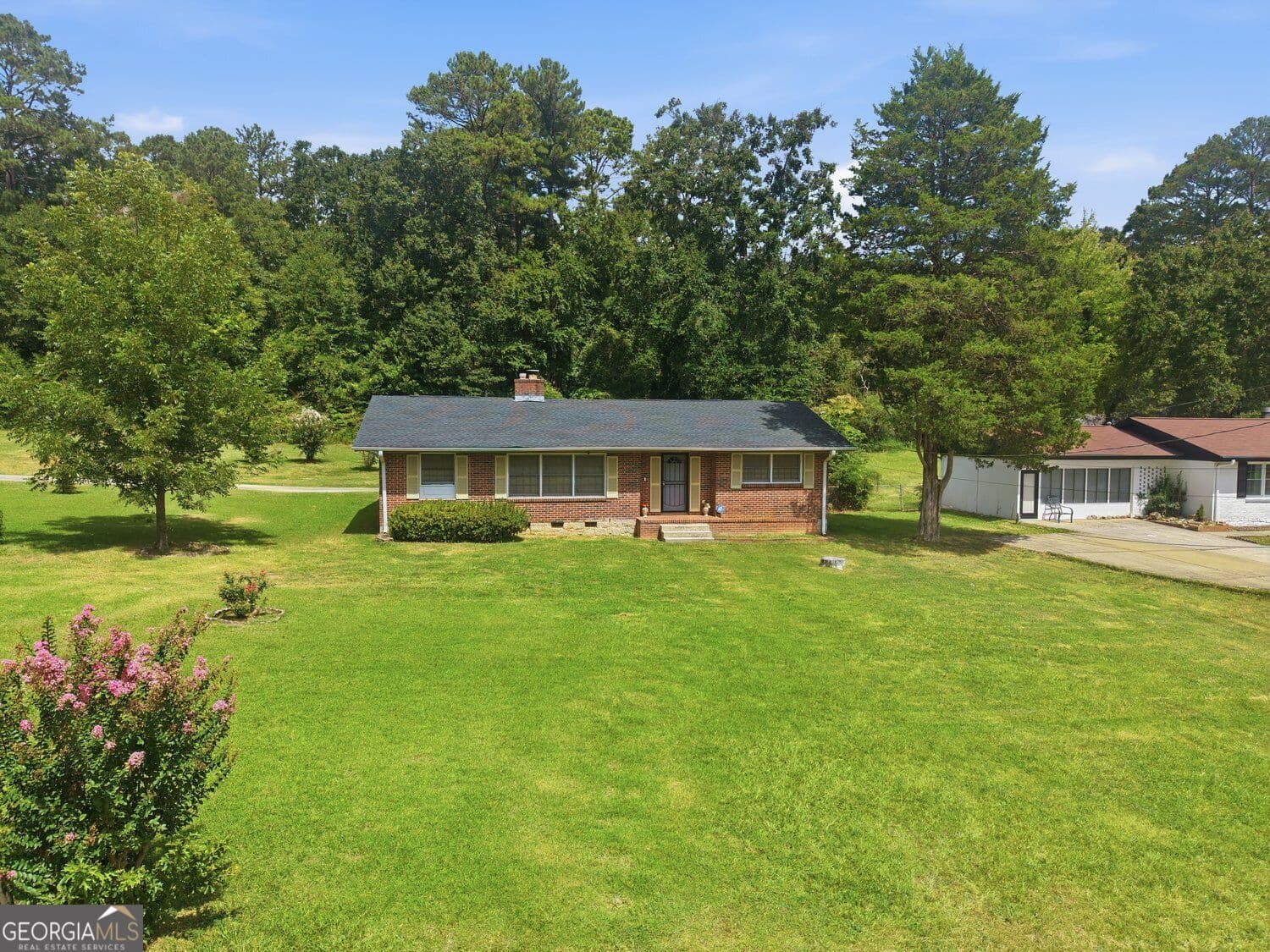 3 bedroom, 2 bathroom, 1,936 sq ft single family residence for sale at 6622 Hawes Drive, Lithonia, GA 30058 — photo 1 of 25