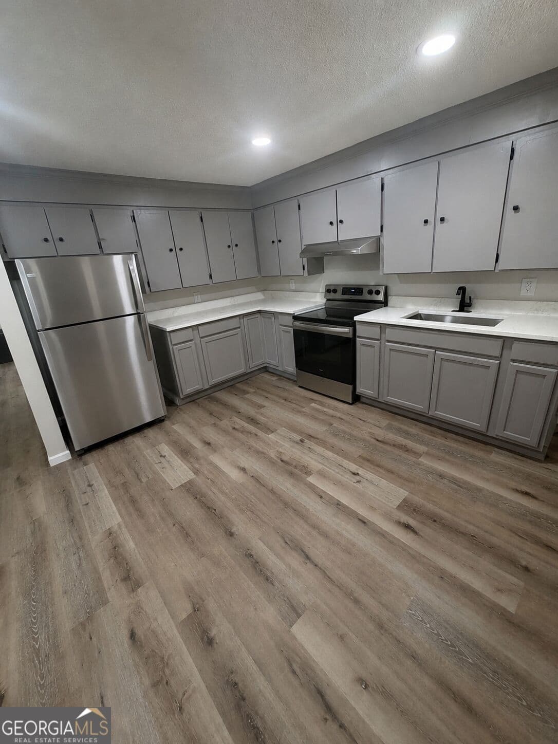 4 bedroom, 2 bathroom, 1,610 sq ft single family residence for sale at 107 Benjamin Street, Fort Valley, GA 31030 — photo 2