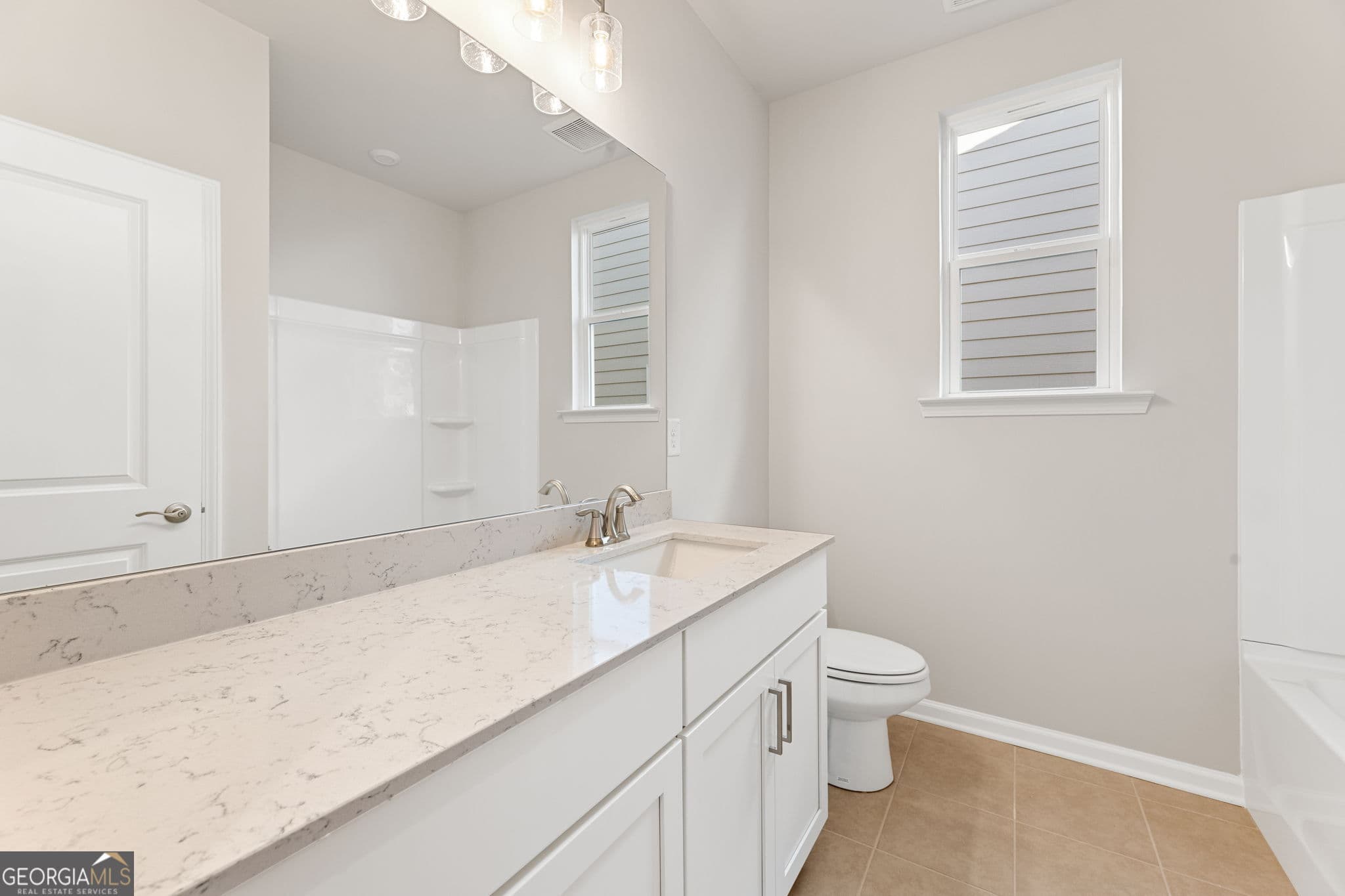 3 bedroom, 2 bathroom single family residence for sale at 1590 Savory Way 63, Loganville, GA 30052 — photo 4