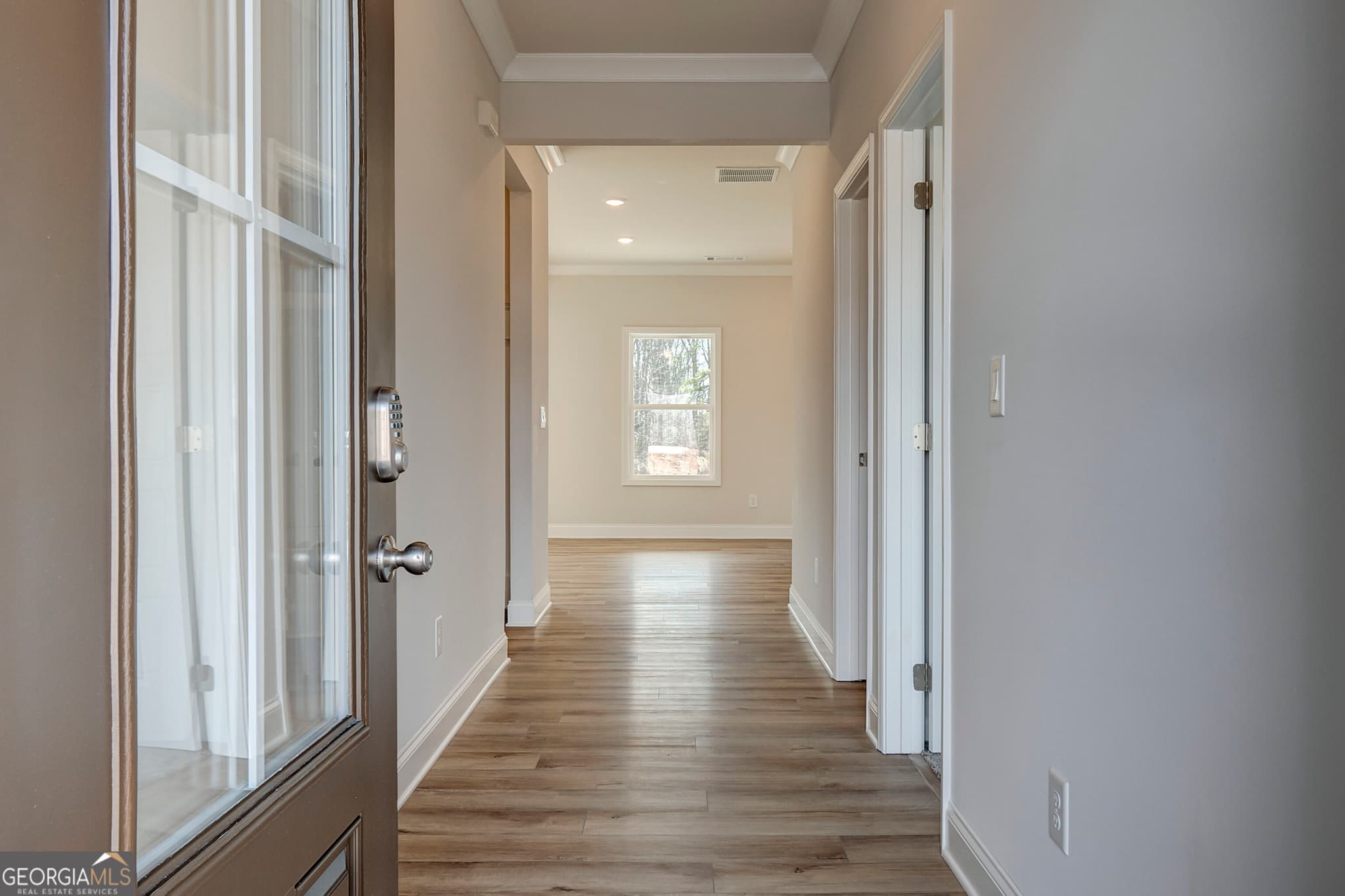 4 bedroom, 3 bathroom, 2,222 sq ft single family residence for sale at 646 Winding Rose Drive, Hoschton, GA 30548 — photo 3