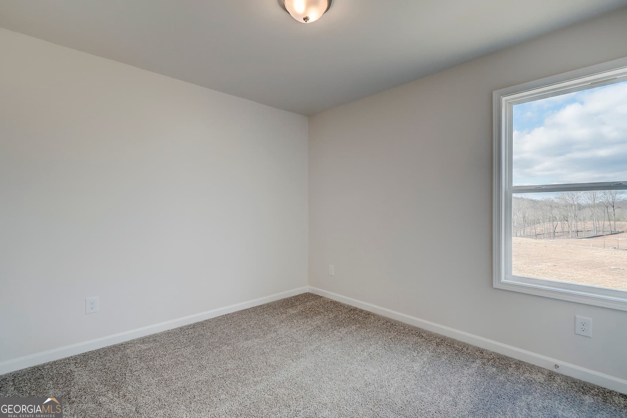 4 bedroom, 3 bathroom, 2,222 sq ft single family residence for sale at 646 Winding Rose Drive, Hoschton, GA 30548 — photo 9