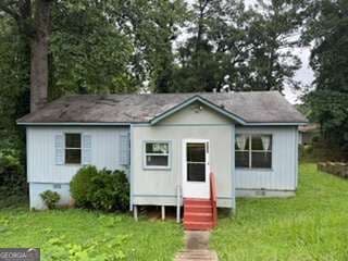 3 bedroom, 2 bathroom, 1,040 sq ft single family residence for sale at 305 Creighton Avenue, Scottdale, GA 30079 — photo 2