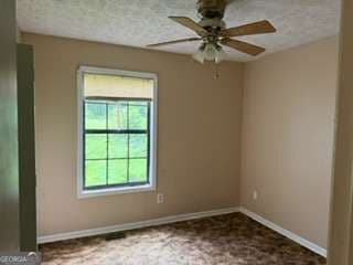 3 bedroom, 2 bathroom, 1,040 sq ft single family residence for sale at 305 Creighton Avenue, Scottdale, GA 30079 — photo 5