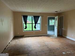 3 bedroom, 2 bathroom, 1,040 sq ft single family residence for sale at 305 Creighton Avenue, Scottdale, GA 30079 — photo 4