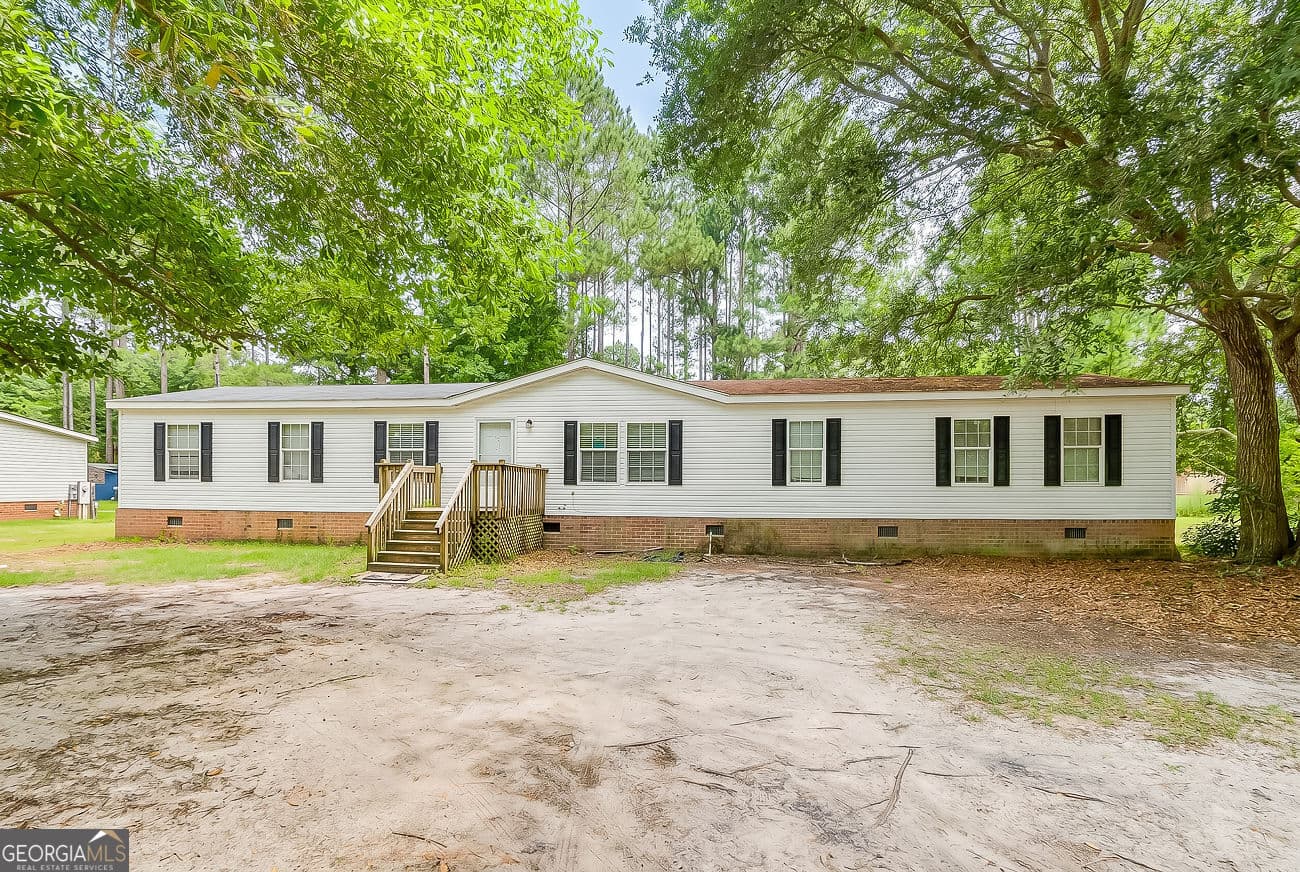 4 bedroom, 2 bathroom manufactured home,single family residence sold at 303 Formosa Drive, Guyton, GA 31312