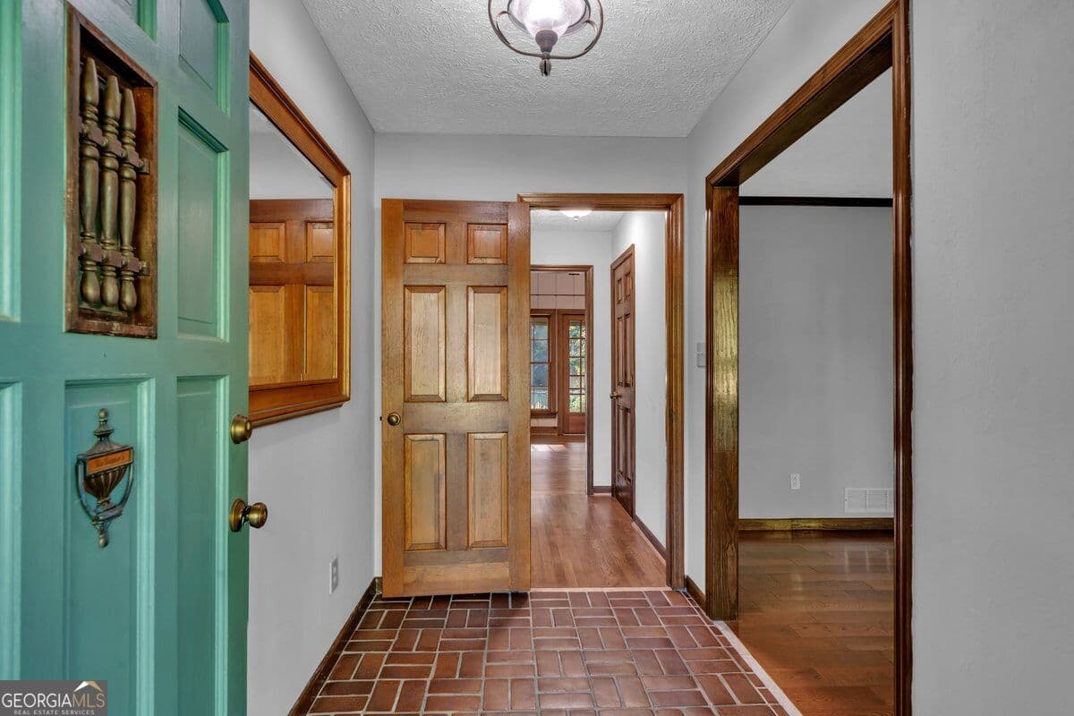 5 bedroom, 4.5 bathroom, 2,821 sq ft single family residence for sale at 6620 New Hope Road, Milner, GA 30257 — photo 2