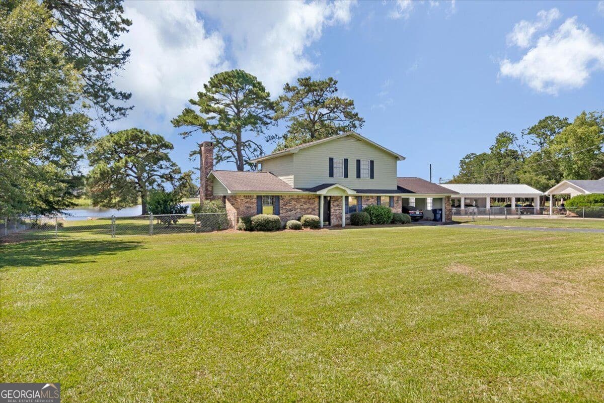 3 bedroom, 2 bathroom, 1,779 sq ft single family residence for sale at 443 Lakeshore Road, Pelham, GA 31779 — photo 2
