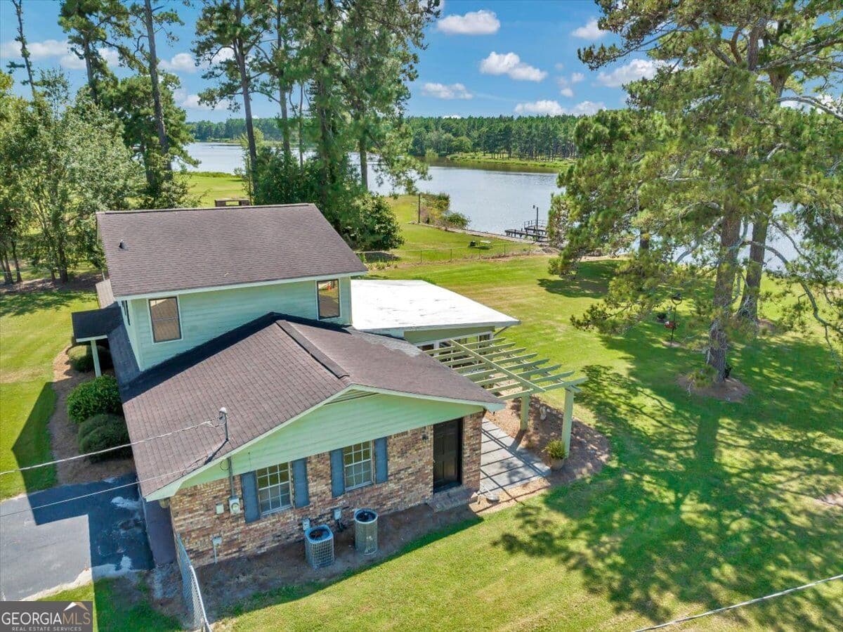 3 bedroom, 2 bathroom, 1,779 sq ft single family residence for sale at 443 Lakeshore Road, Pelham, GA 31779 — photo 6