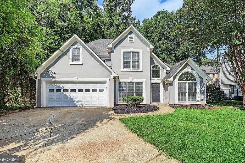 3 bedroom, 2.5 bathroom, 2,070 sq ft single family residence for sale at 418 Middle Valley Lane, Woodstock, GA 30189 — photo 1 of 17