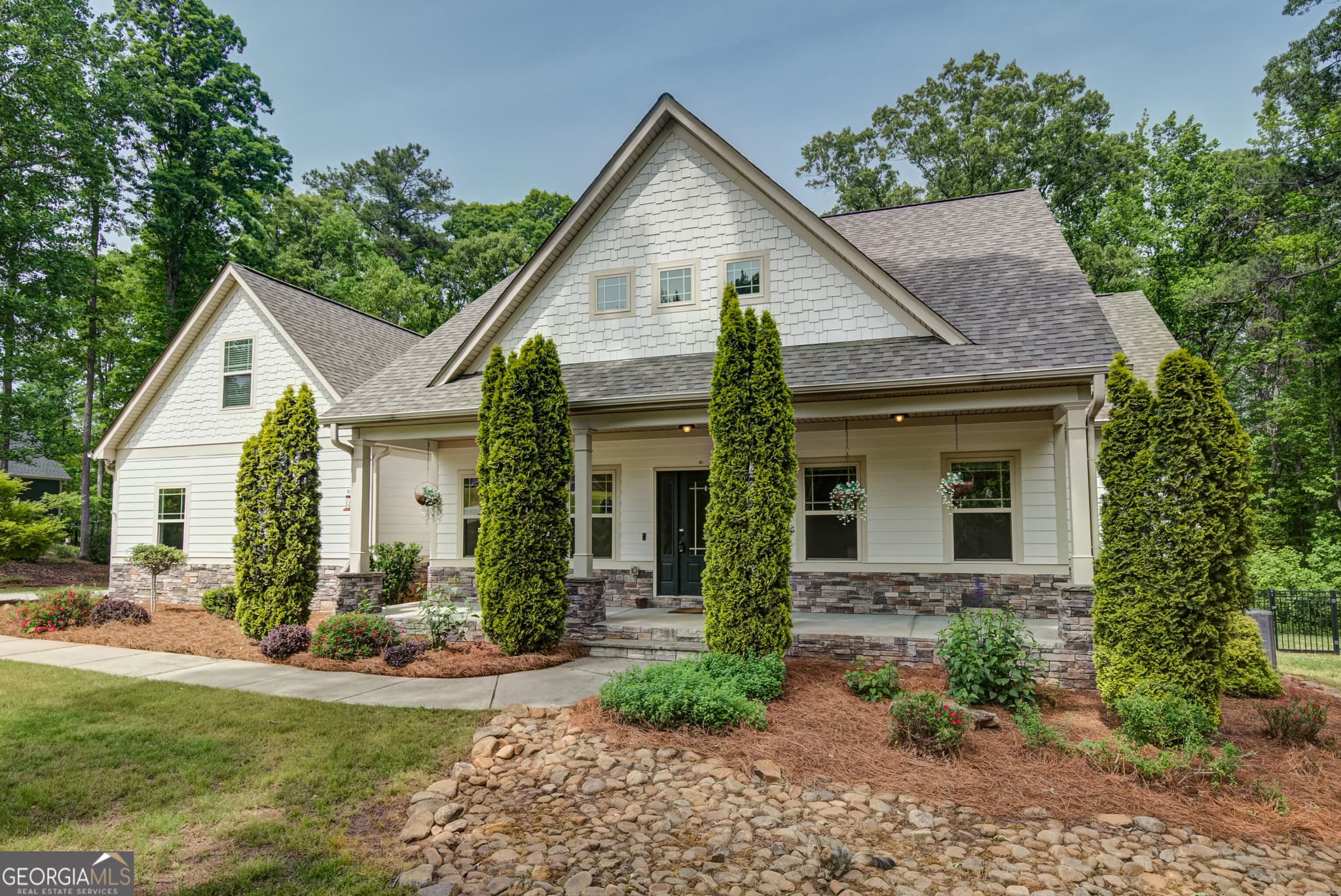 5 bedroom, 4 bathroom, 5,040 sq ft single family residence for sale at 105 Laurel Forest Drive, Tyrone, GA 30290 — photo 2