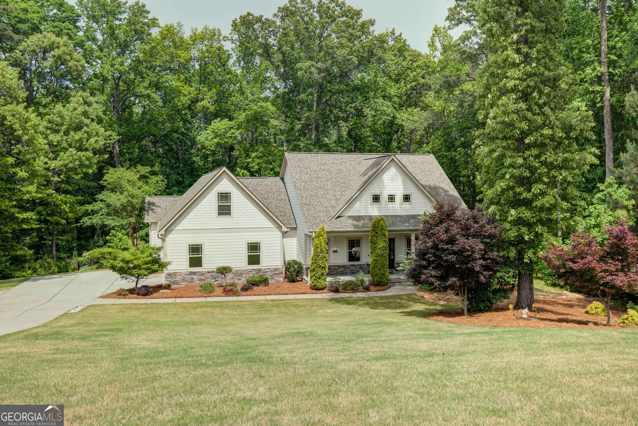 5 bedroom, 4 bathroom, 5,040 sq ft single family residence for sale at 105 Laurel Forest Drive, Tyrone, GA 30290 — photo 4