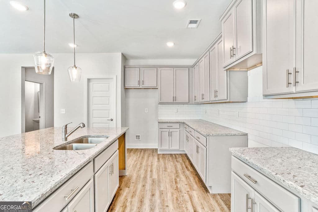 4 bedroom, 3.5 bathroom, 2,344 sq ft single family residence for sale at 485 Lawson Drive 28, Mansfield, GA 30055 — photo 7