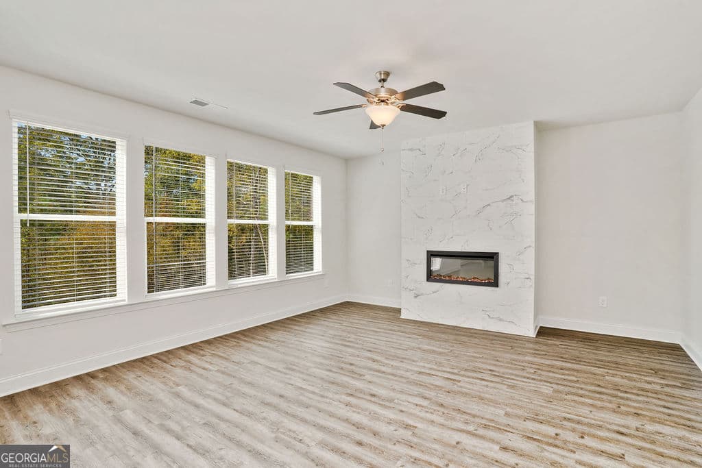 4 bedroom, 3.5 bathroom, 2,344 sq ft single family residence for sale at 485 Lawson Drive 28, Mansfield, GA 30055 — photo 5