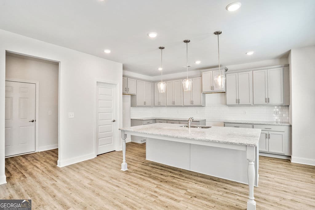 4 bedroom, 3.5 bathroom, 2,344 sq ft single family residence for sale at 485 Lawson Drive 28, Mansfield, GA 30055 — photo 8