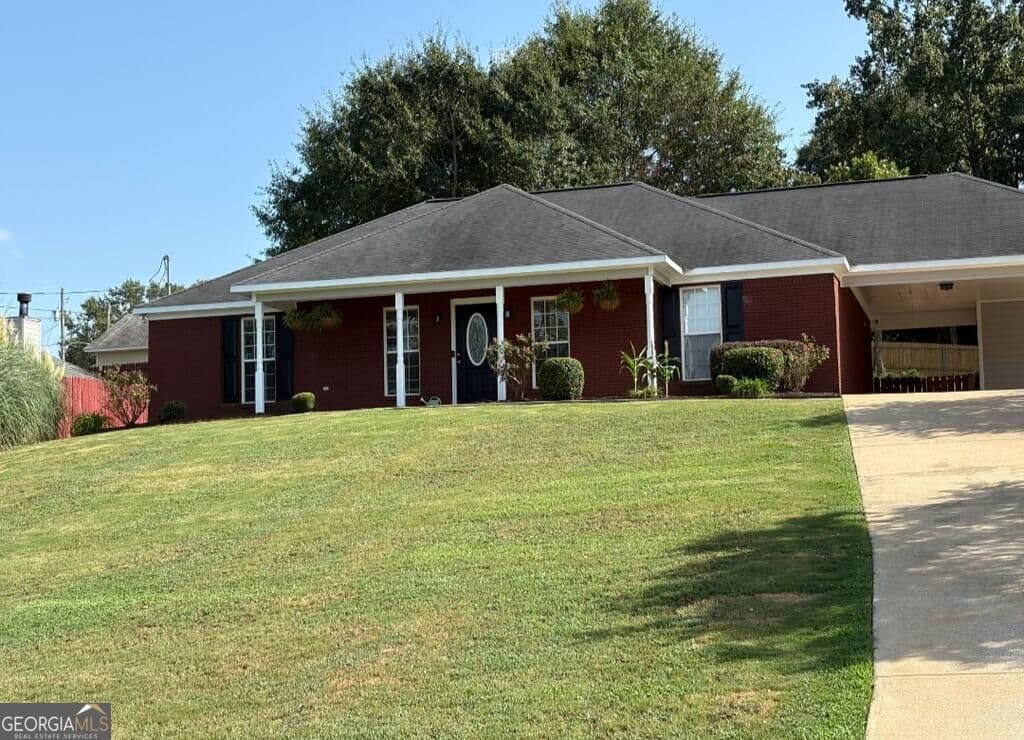 3 bedroom, 2 bathroom, 1,410 sq ft single family residence for sale at 54 Lee Road 2108, Phenix City, AL 36870 — photo 2