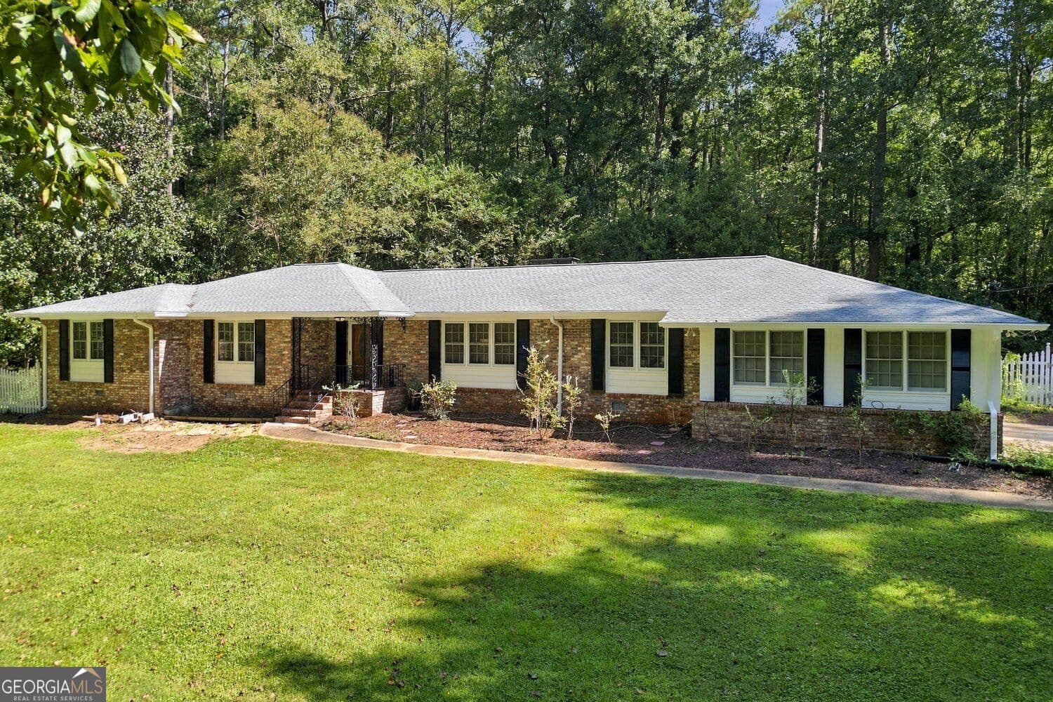 4 bedroom, 2.5 bathroom, 3,080 sq ft single family residence for sale at 2207 Rosser Place, Smoke Rise, GA 30087