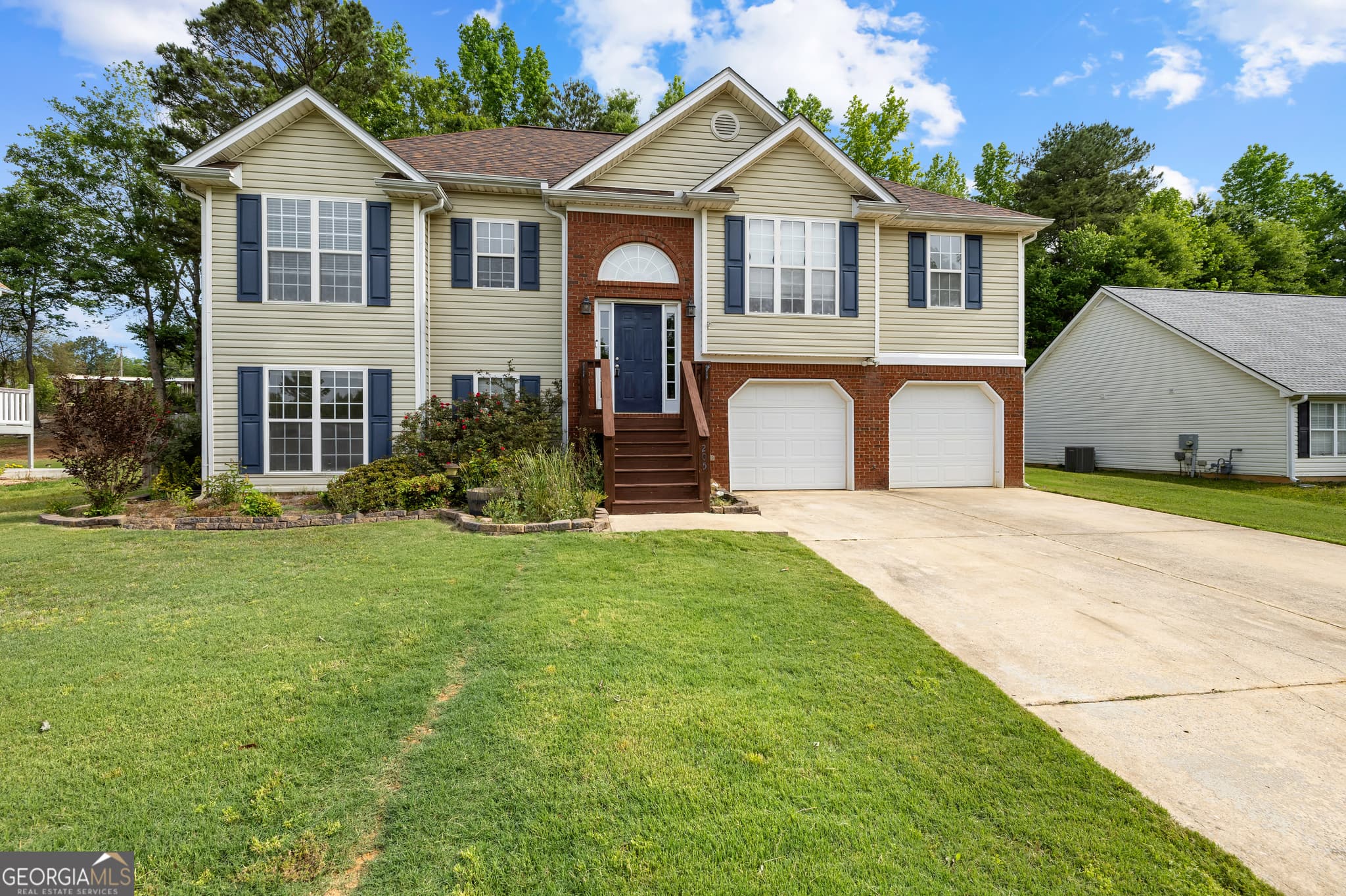 5 bedroom, 3 bathroom, 2,021 sq ft single family residence sold at 205 Clarion Drive, Carrollton, GA 30116