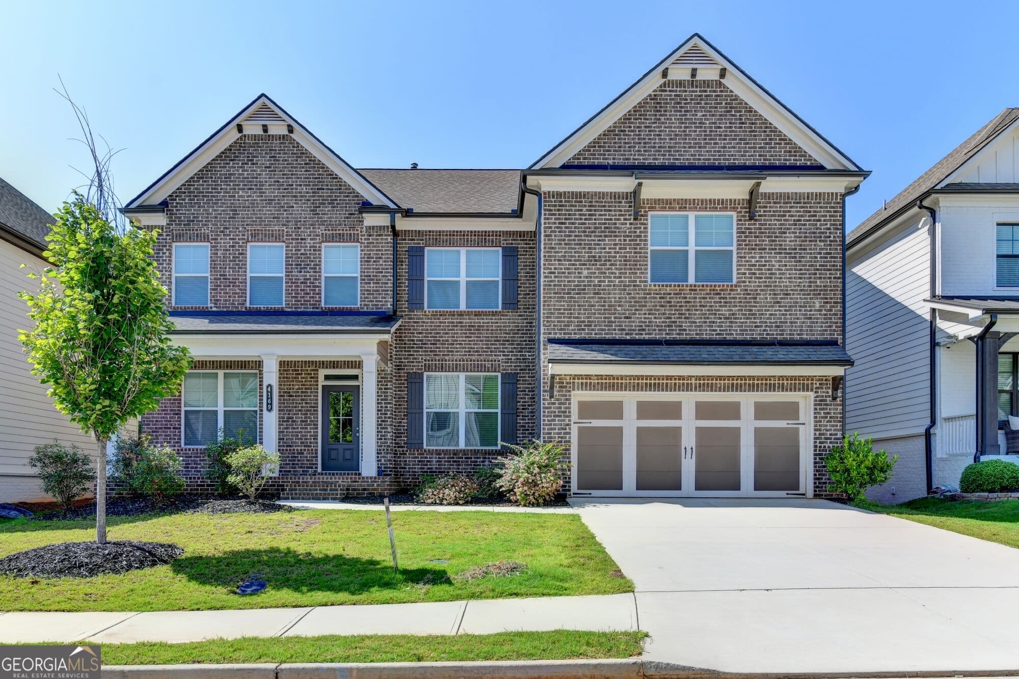 5 bedroom, 4 bathroom, 3,860 sq ft single family residence for sale at 4169 Brookmont Way, Auburn, GA 30011 — photo 3