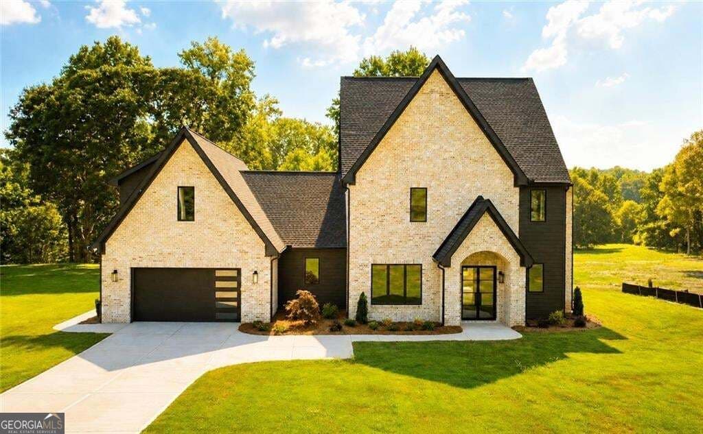 5 bedroom, 4.5 bathroom, 4,704 sq ft single family residence for sale at 6218 Blackjack Road, Flowery Branch, GA 30542