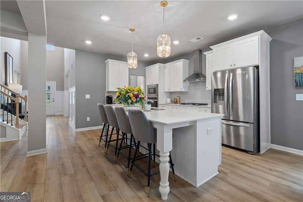 5 bedroom, 4.5 bathroom, 3,699 sq ft single family residence for sale at 121 Dohrn Drive, Loganville, GA 30052 — photo 6