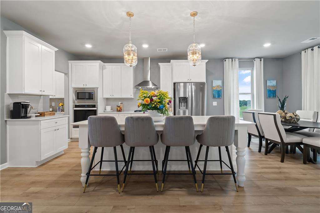 5 bedroom, 4.5 bathroom, 3,699 sq ft single family residence for sale at 121 Dohrn Drive, Loganville, GA 30052 — photo 5