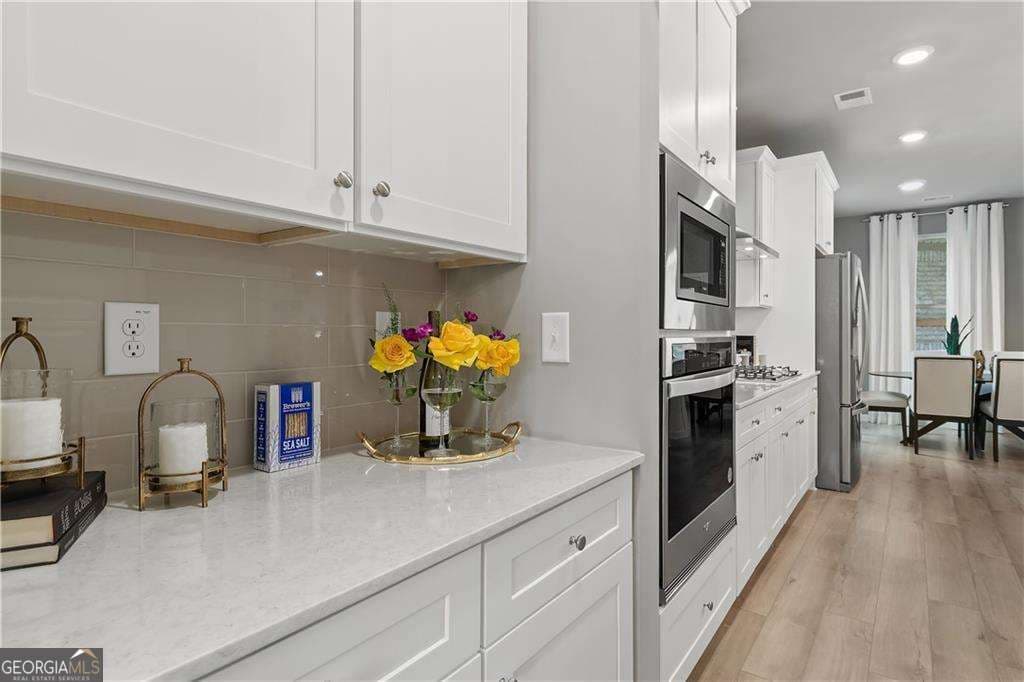 5 bedroom, 4.5 bathroom, 3,699 sq ft single family residence for sale at 121 Dohrn Drive, Loganville, GA 30052 — photo 8