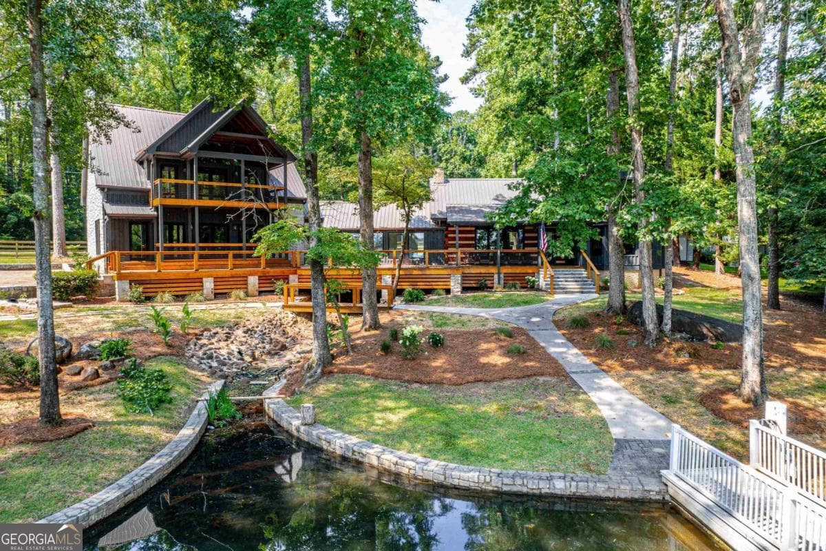 4 bedroom, 4 bathroom, 4,524 sq ft cabin,single family residence sold at 1040 Chieftian Way, White Plains, GA 30678