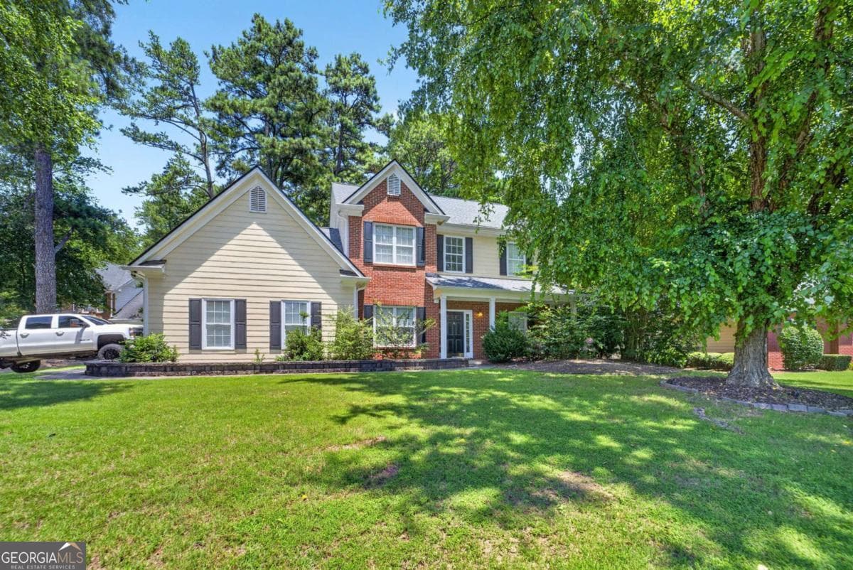 4 bedroom, 2.5 bathroom, 2,324 sq ft single family residence for sale at 1355 Grace Hadaway Lane, Lawrenceville, GA 30043 — photo 2