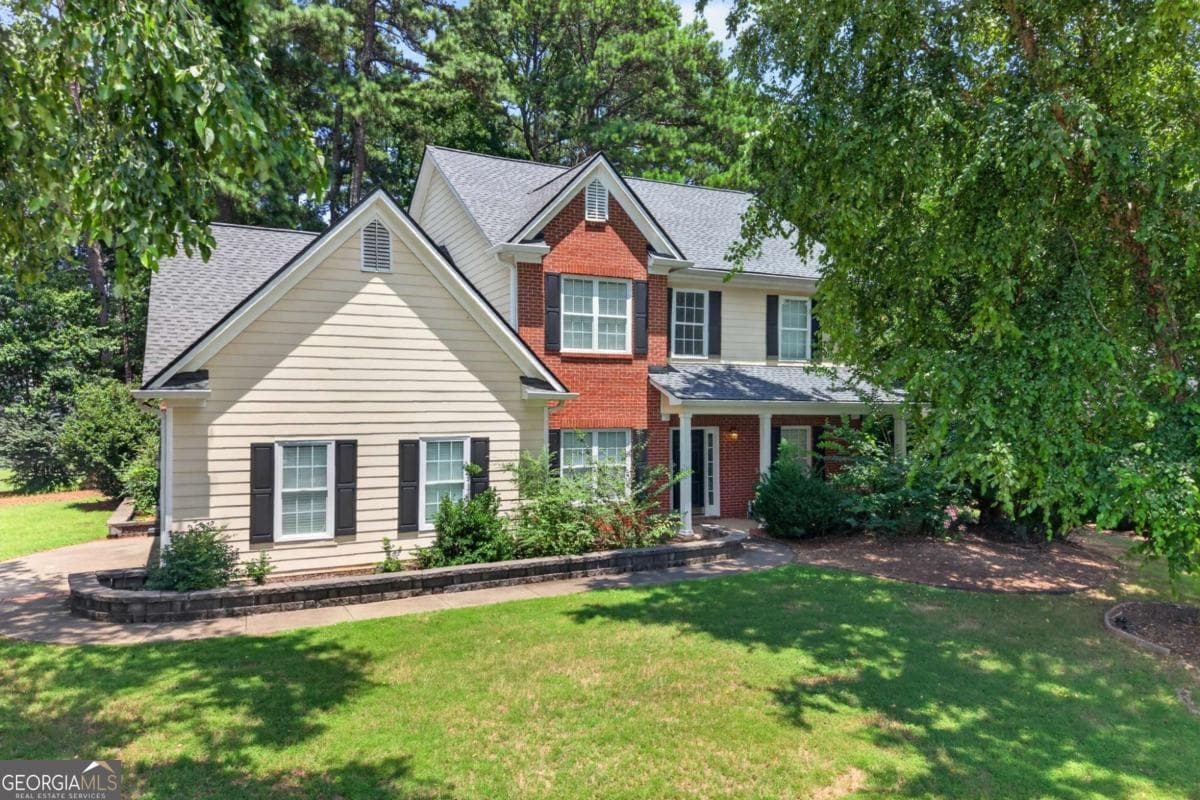 4 bedroom, 2.5 bathroom, 2,324 sq ft single family residence for sale at 1355 Grace Hadaway Lane, Lawrenceville, GA 30043 — photo 1 of 63