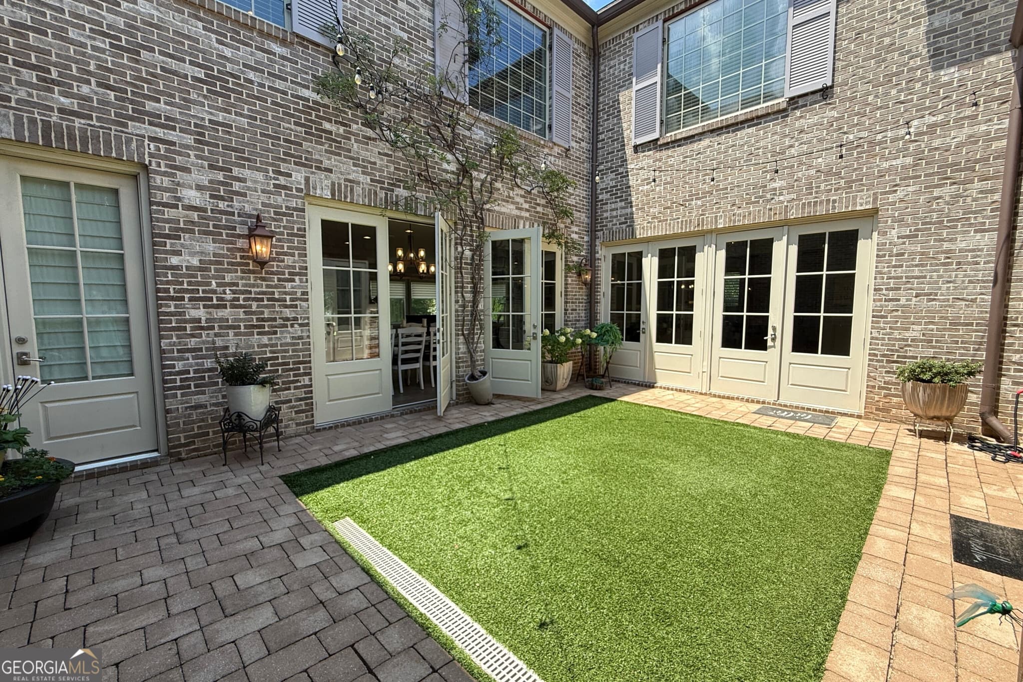 6 bedroom, 6.5 bathroom, 6,101 sq ft single family residence for sale at 6509 Snug Harbor Court, Flowery Branch, GA 30542 — photo 7