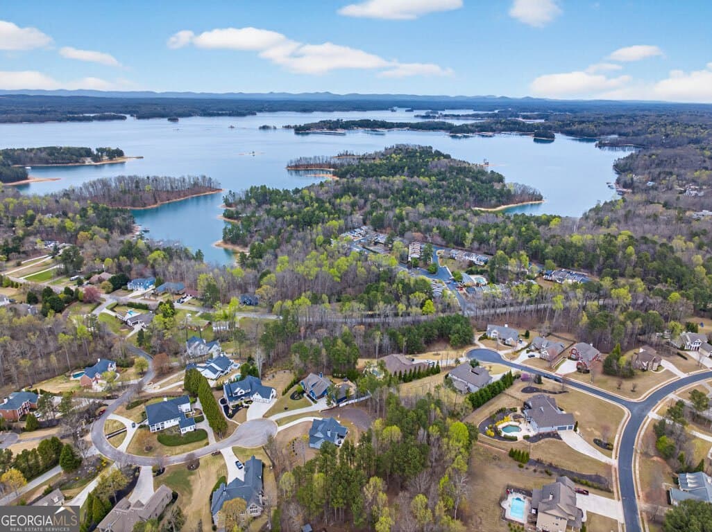 6 bedroom, 6.5 bathroom, 6,101 sq ft single family residence for sale at 6509 Snug Harbor Court, Flowery Branch, GA 30542 — photo 3