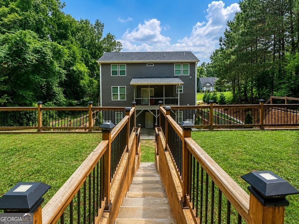 4 bedroom, 2 bathroom, 3,322 sq ft single family residence for sale at 655 Transit Circle, Atlanta, GA 30349 — photo 9