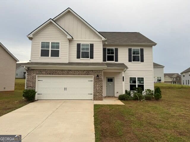 4 bedroom, 2.5 bathroom, 2,191 sq ft single family residence for sale at 1156 Bodega Loop, Locust Grove, GA 30248 — photo 1 of 23