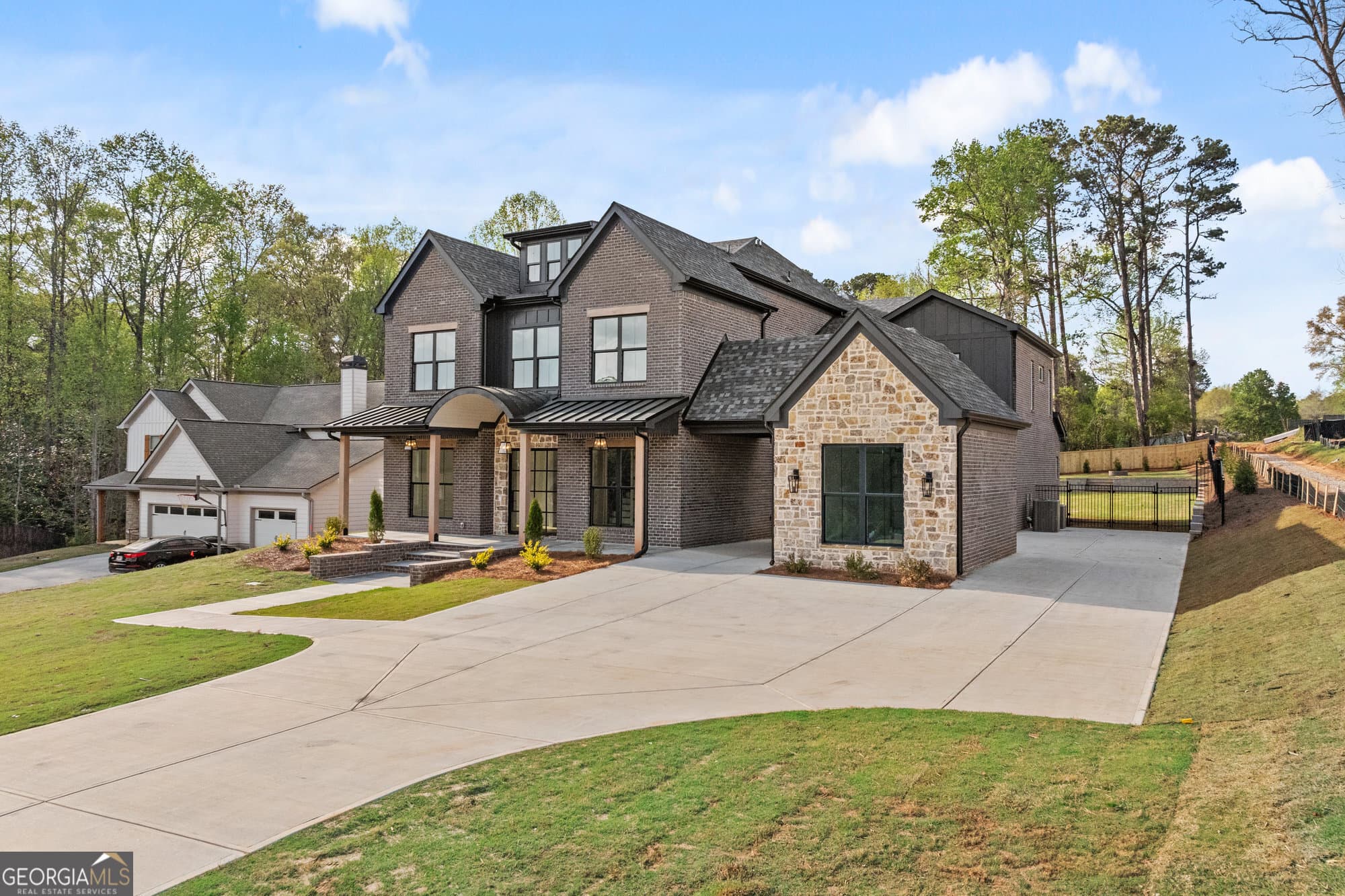 7 bedroom, 8.5 bathroom, 8,600 sq ft single family residence for sale at 3299 Bailey Road, Mulberry, GA 30019 — photo 2