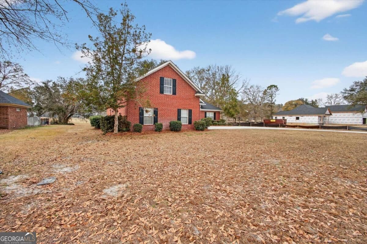 3 bedroom, 3 bathroom, 2,441 sq ft single family residence for sale at 58 Lansing Drive, Ellabell, GA 31308 — photo 2