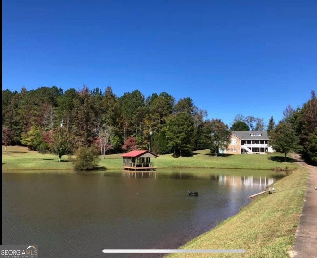 5 bedroom, 4.5 bathroom, 5,013 sq ft single family residence sold at 705 Wilson Road, Luthersville, GA 30251