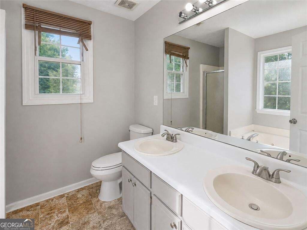 5 bedroom, 3 bathroom, 3,658 sq ft single family residence for rent at 2657 Amberly Glen Drive, Dacula, GA 30019 for $2,500 a month — photo 9