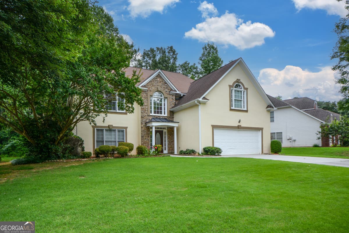 4 bedroom, 2.5 bathroom, 2,118 sq ft single family residence for sale at 4736 Cedar Wood Drive, Lilburn, GA 30047 — photo 3