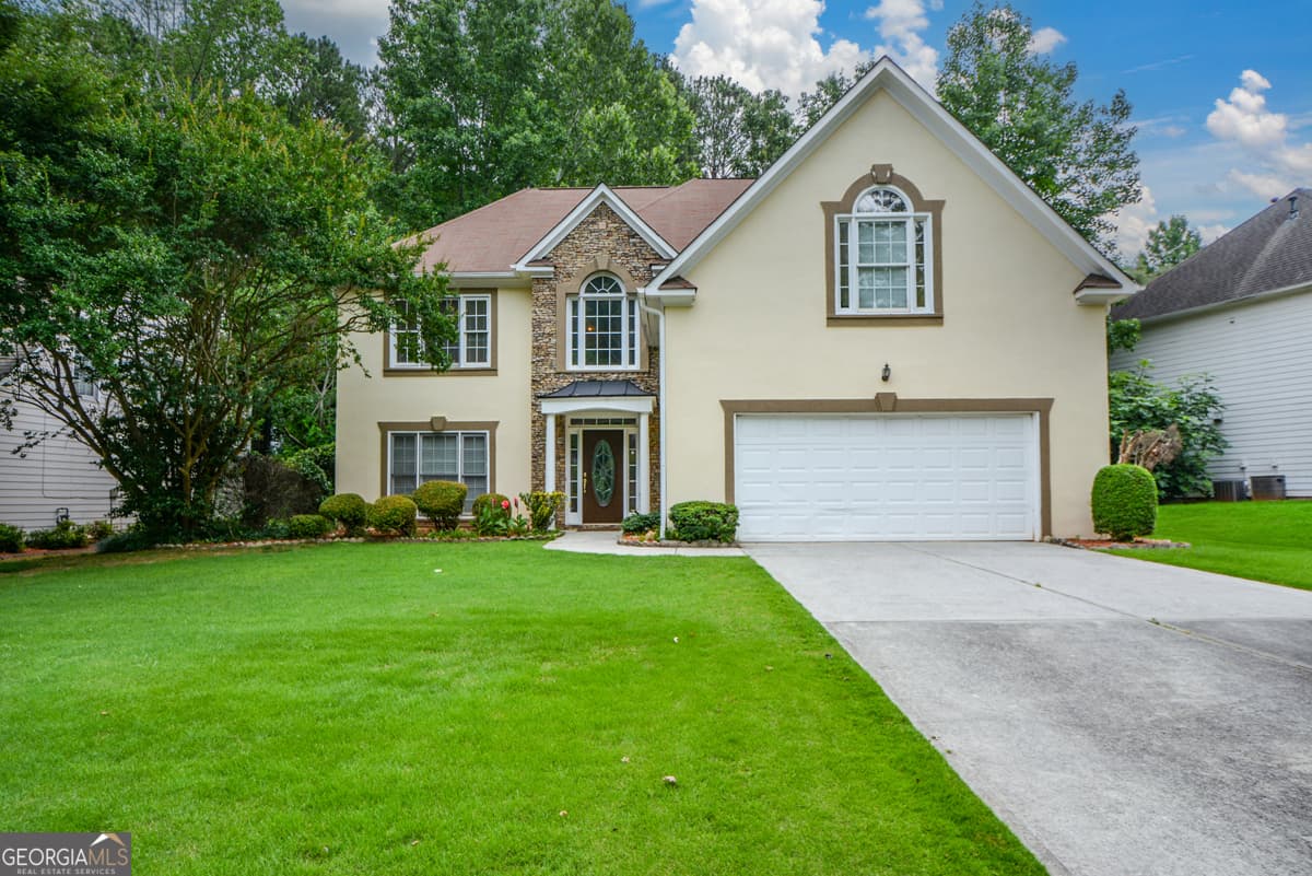 4 bedroom, 2.5 bathroom, 2,118 sq ft single family residence for sale at 4736 Cedar Wood Drive, Lilburn, GA 30047