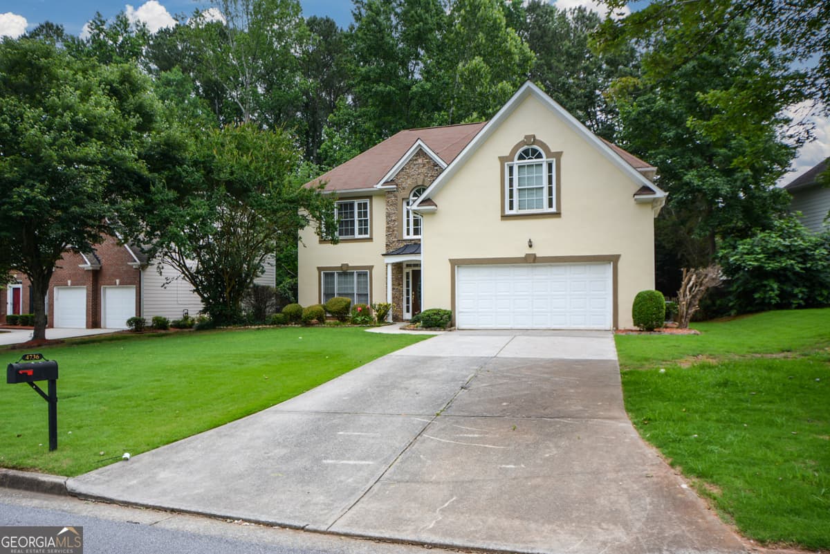 4 bedroom, 2.5 bathroom, 2,118 sq ft single family residence for sale at 4736 Cedar Wood Drive, Lilburn, GA 30047 — photo 4