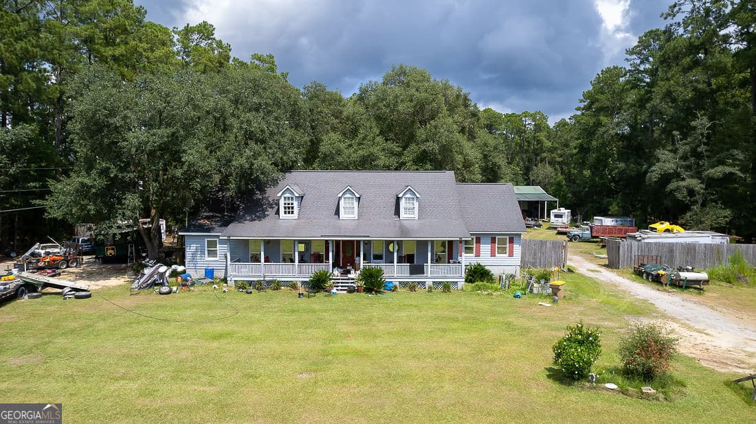 4 bedroom, 2 bathroom, 2,455 sq ft single family residence for sale at 2301 Us Highway 80, Bloomingdale, GA 31302 — photo 2