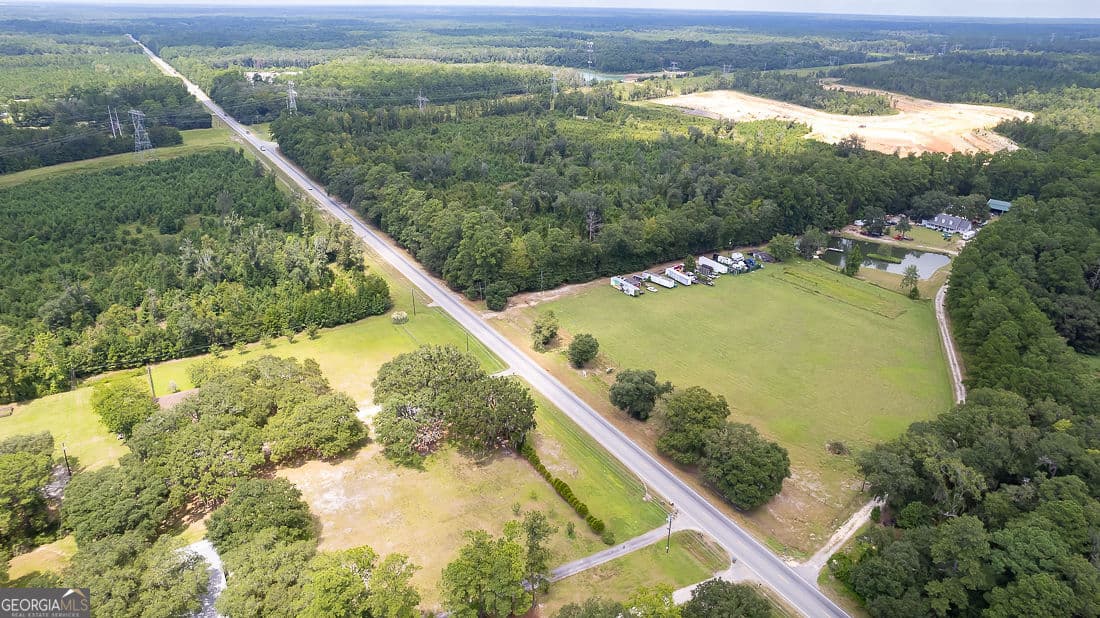 4 bedroom, 2 bathroom, 2,455 sq ft single family residence for sale at 2301 Us Highway 80, Bloomingdale, GA 31302 — photo 6