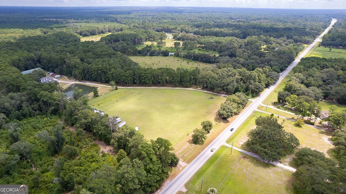 4 bedroom, 2 bathroom, 2,455 sq ft single family residence for sale at 2301 Us Highway 80, Bloomingdale, GA 31302 — photo 5
