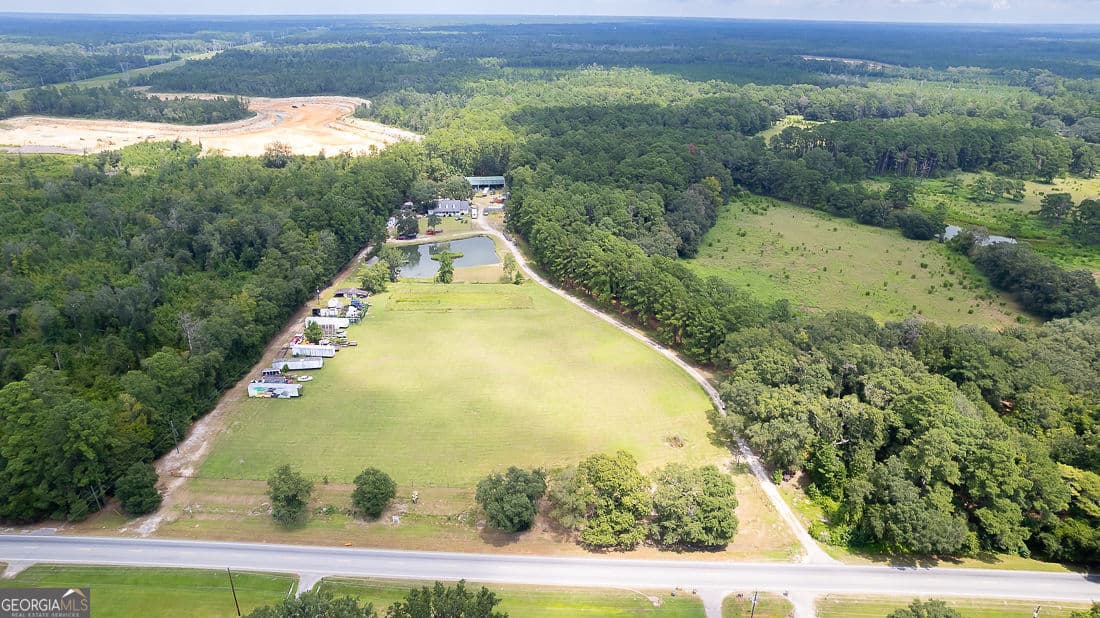 4 bedroom, 2 bathroom, 2,455 sq ft single family residence for sale at 2301 Us Highway 80, Bloomingdale, GA 31302 — photo 4