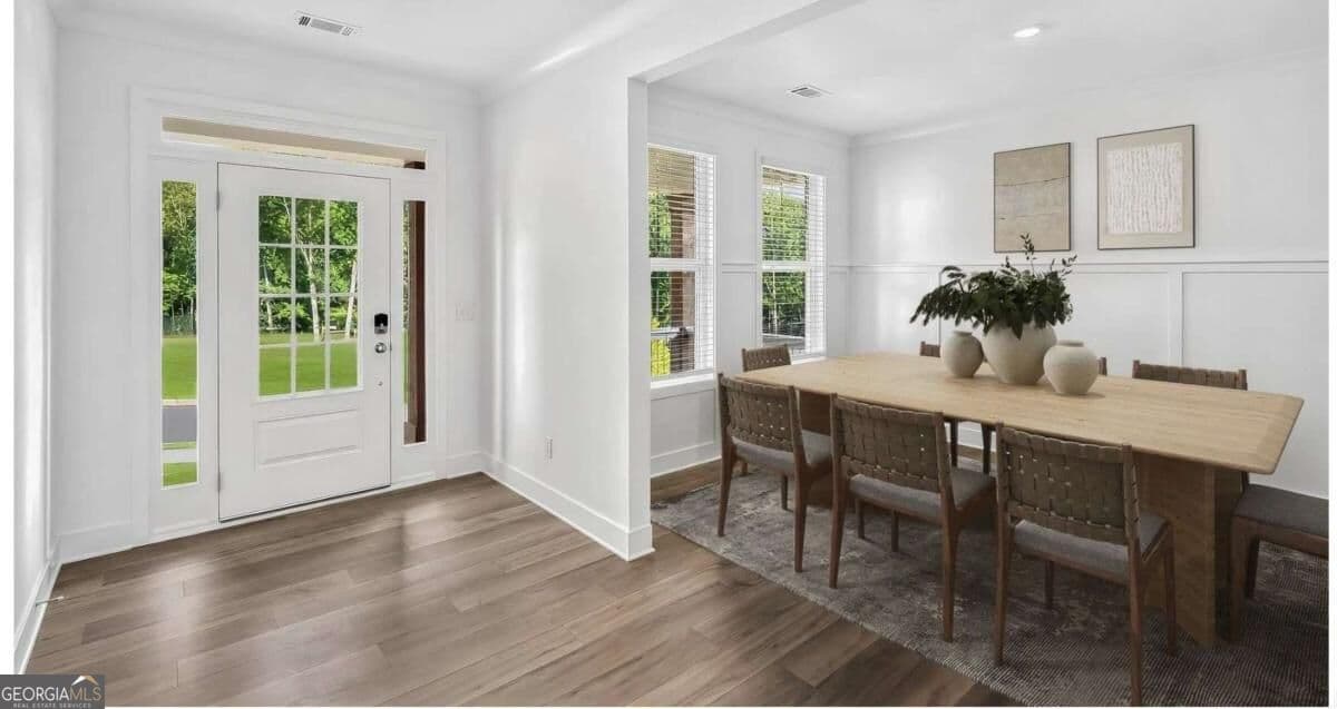 4 bedroom, 3 bathroom, 3,065 sq ft single family residence for sale at 4545 Coburn Path, Cumming, GA 30028 — photo 2