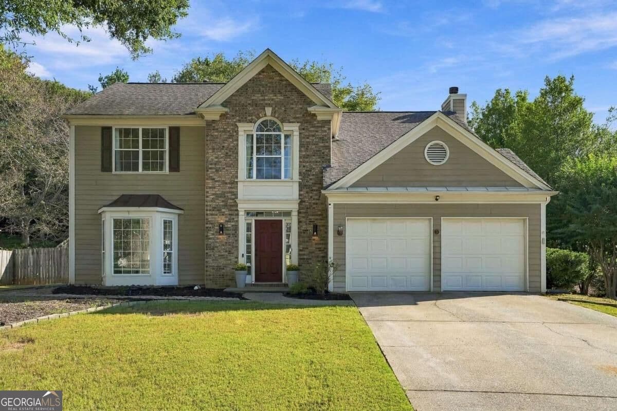 4 bedroom, 2.5 bathroom, 2,160 sq ft single family residence for sale at 3435 Lakeheath Drive, Cumming, GA 30041 — photo 2