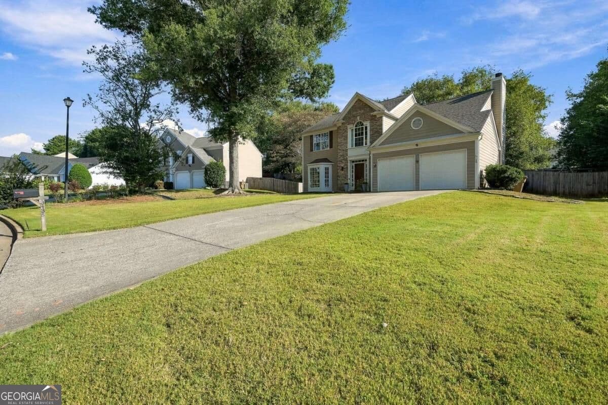 4 bedroom, 2.5 bathroom, 2,160 sq ft single family residence for sale at 3435 Lakeheath Drive, Cumming, GA 30041 — photo 3